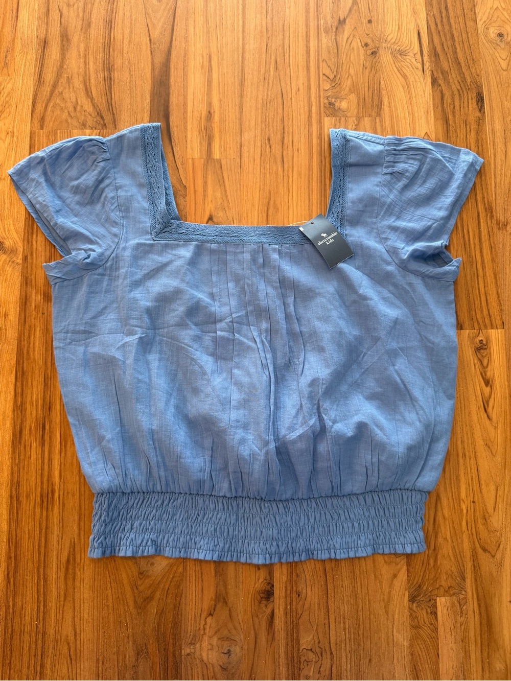 NWT Abercrombie Kids Lace Trim Smocked Waist Shirt Girls’ 17/18 Blue